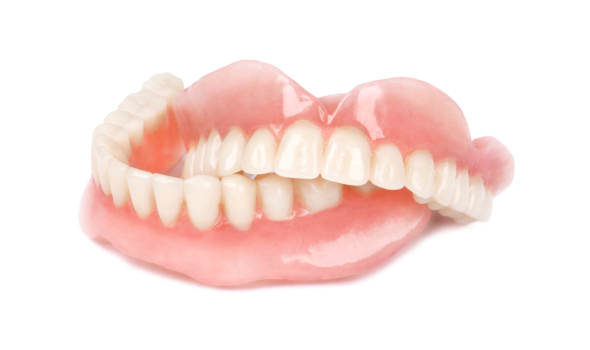 Set of dentures on white background.
