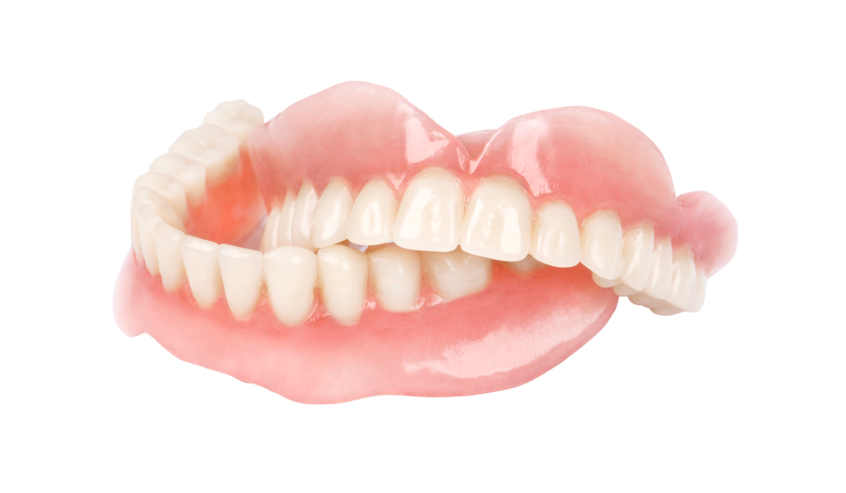 Set of realistic dentures displayed prominently.